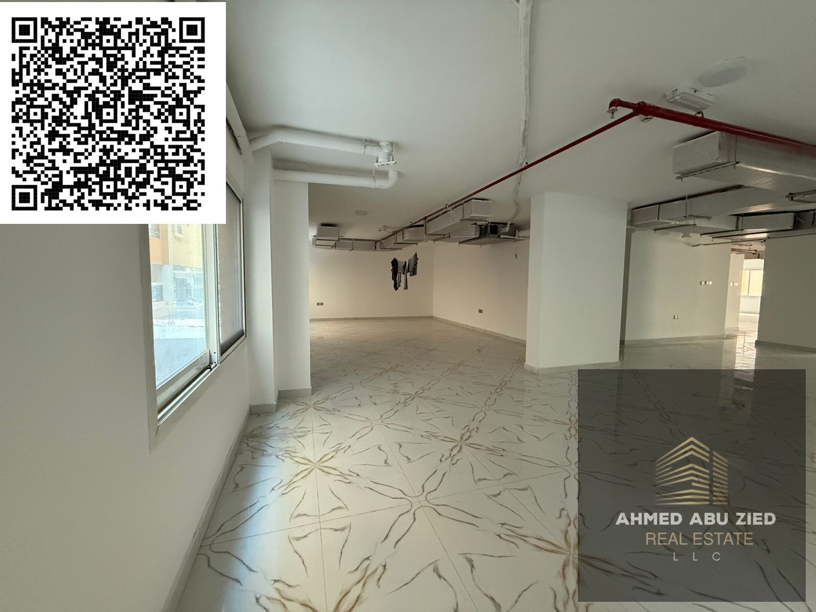 --- Luxury office or commercial floor for annual rent in Al Muwaihat 3, Ajman. 2500 sq ft, new building with a modern design and prime location close