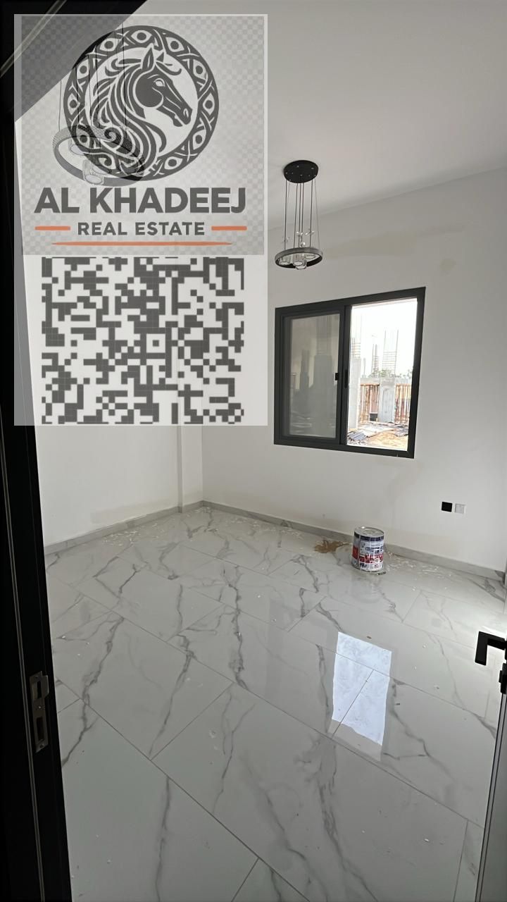 Two bedrooms and a large living room, ground floor, in Al-Aliya area, Ajman, close to all services and main roads.