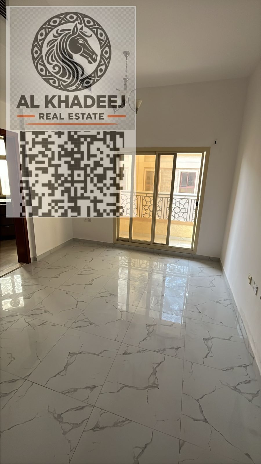 A spacious one-bedroom apartment with a balcony in the Al-Aliya area of Ajman, close to all services and main roads.