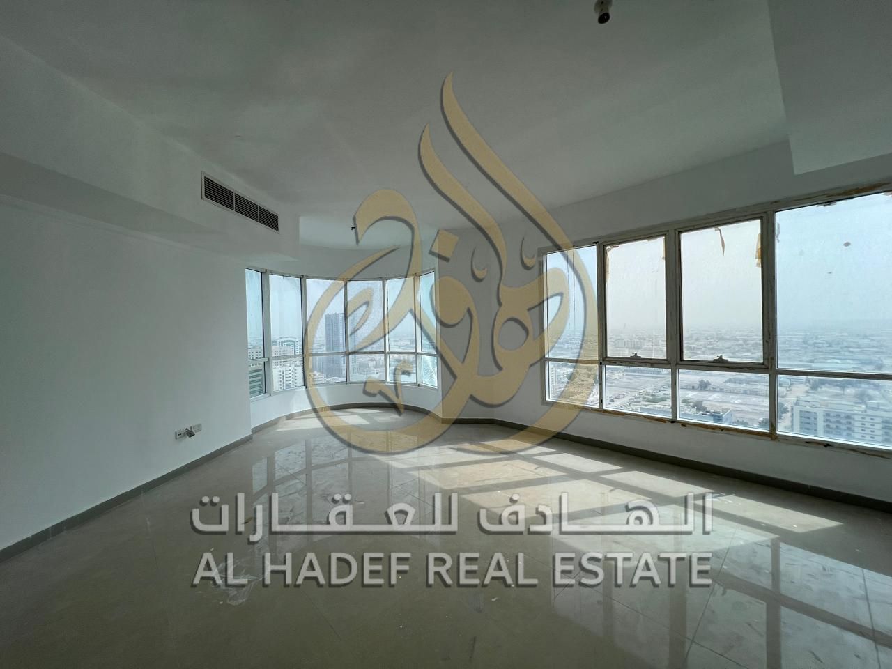 For rent in Al Majaz 2, a 3-bedroom apartment with a living room, near Al Buhaira Police Station - with a free pool in the tower - free parking