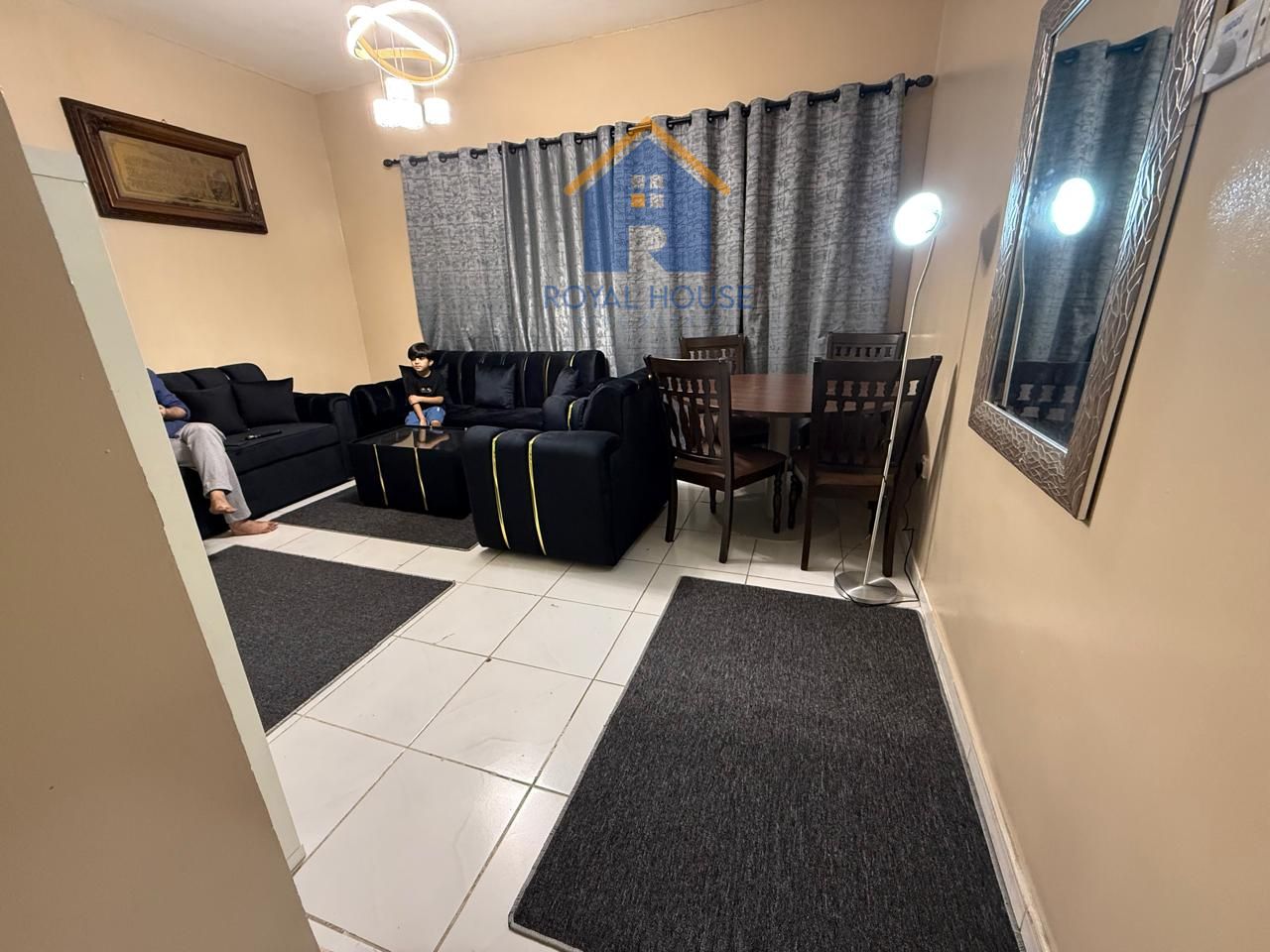One bedroom and living room in Al Qasimia, direct view