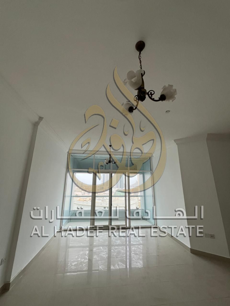 For rent in Al Taawun: 3-bedroom apartment with living room and maid's room + balcony with open view - Free gym and swimming pool - Free parking - One