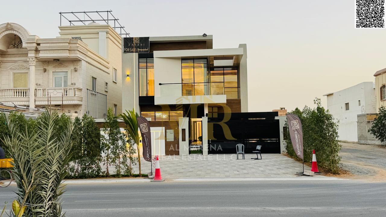 Villa for sale in Ajman, corner lot, at a bargain price, including air conditioning, electricity, and water. Excellent location. Freehold ownership fo