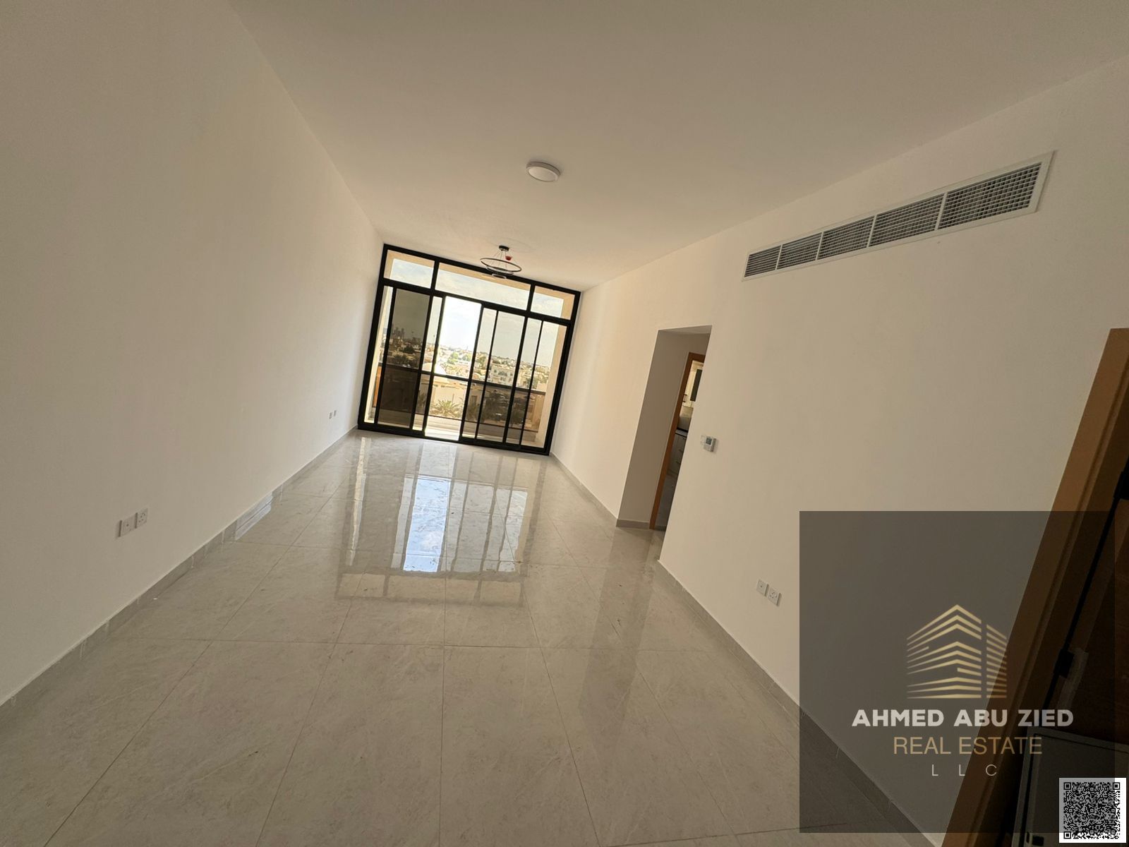 2BR apartment with storage, spacious living room, balcony, central AC, modern décor & lighting, flexible payments, security cheque, regular maintenanc