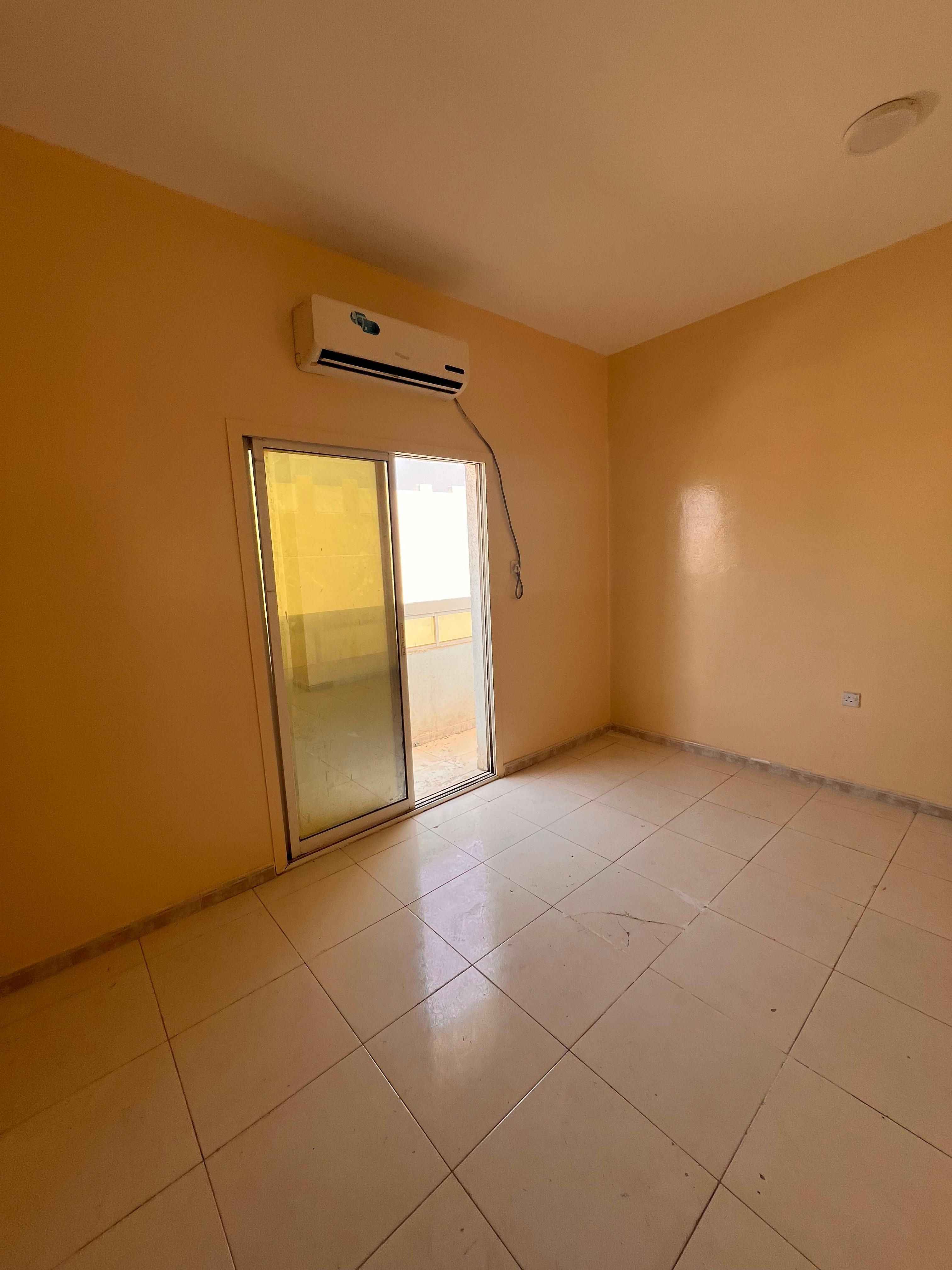 For rent: One bedroom, living room, bathroom, balcony, separate lounge, spacious areas, Al Muwaihat 2