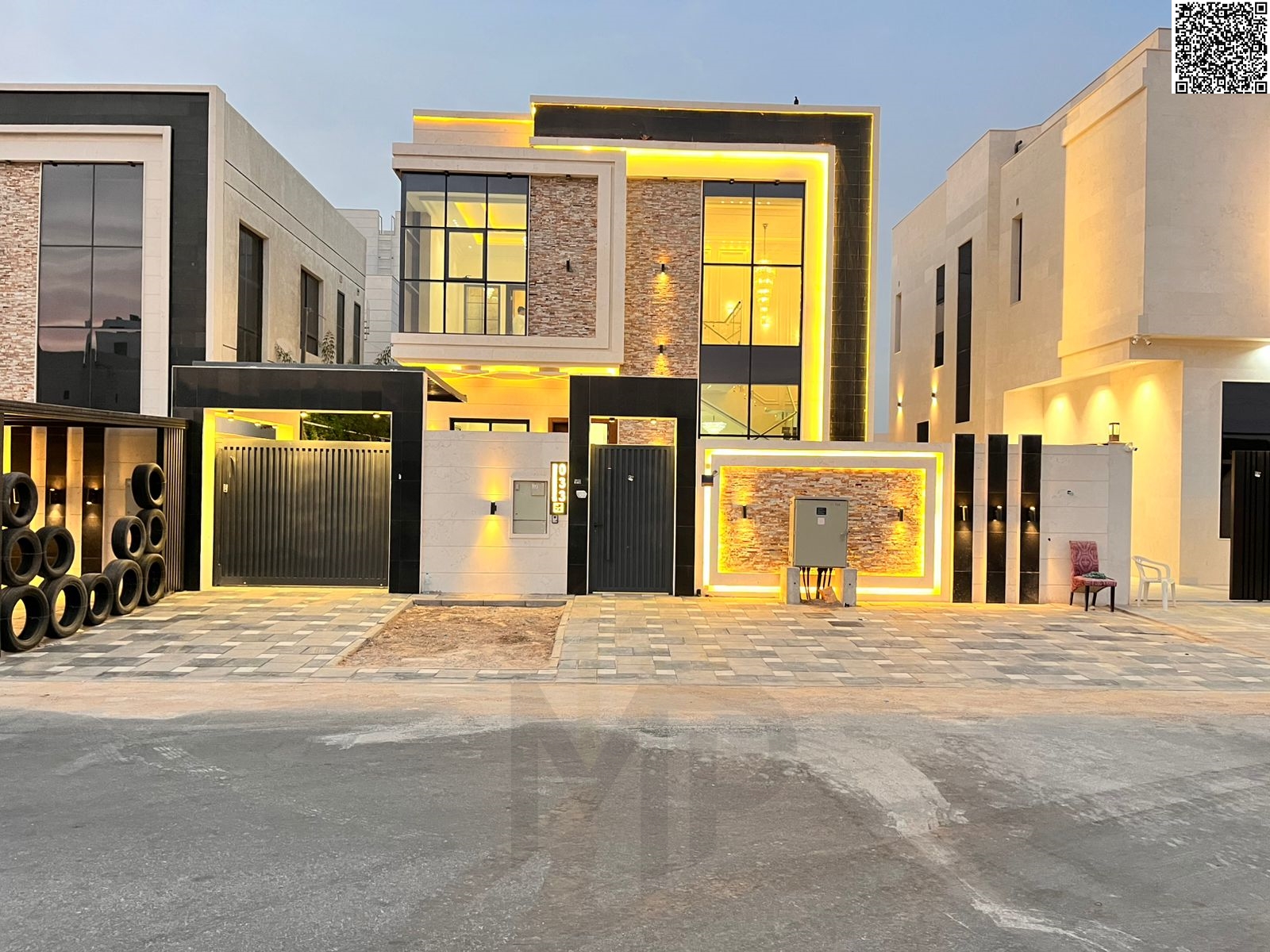 Luxury villa for sale with two floors and a spacious yard, near Sheikh Mohammed Bin Zayed Road, with freehold ownership for life for all nationalities