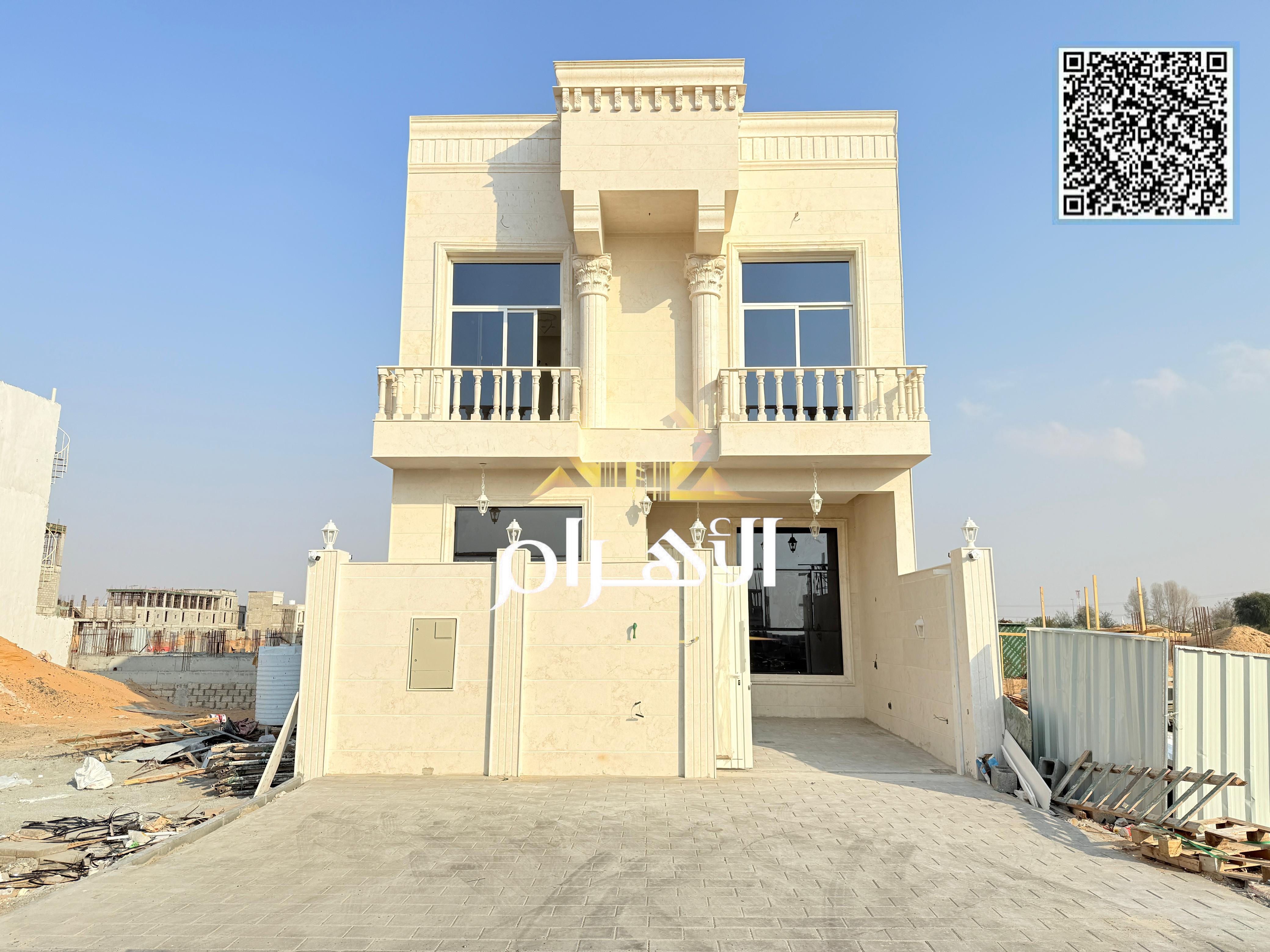 Upscale townhouse with roof terrace for sale in Al Helio 2, Ajman. Special price and mortgage available. Stylish townhouse with a modern design in a q