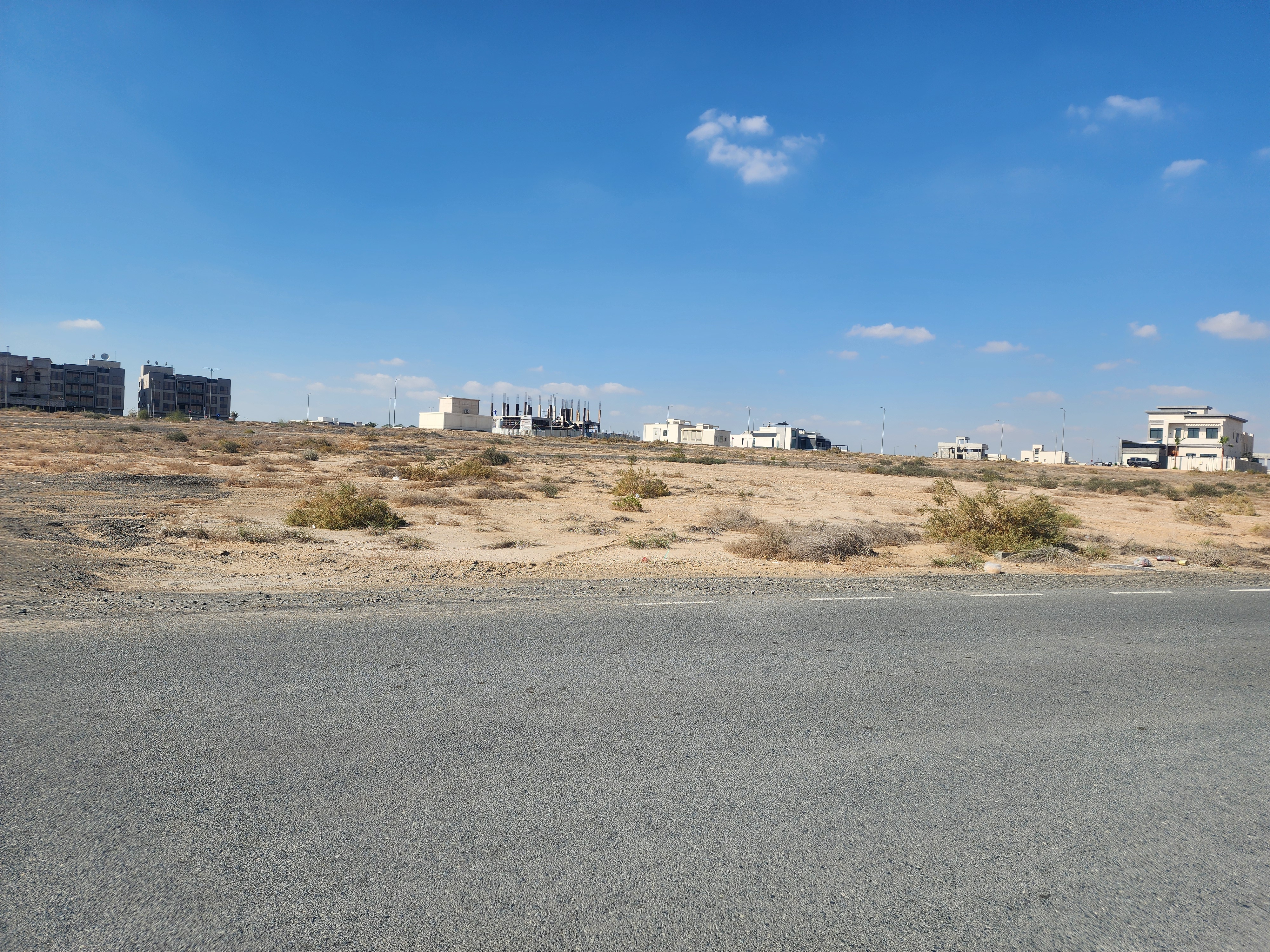 For sale Unique opportunity G + 4 floors commercial residential plot Al Bataeh,- Sharjah