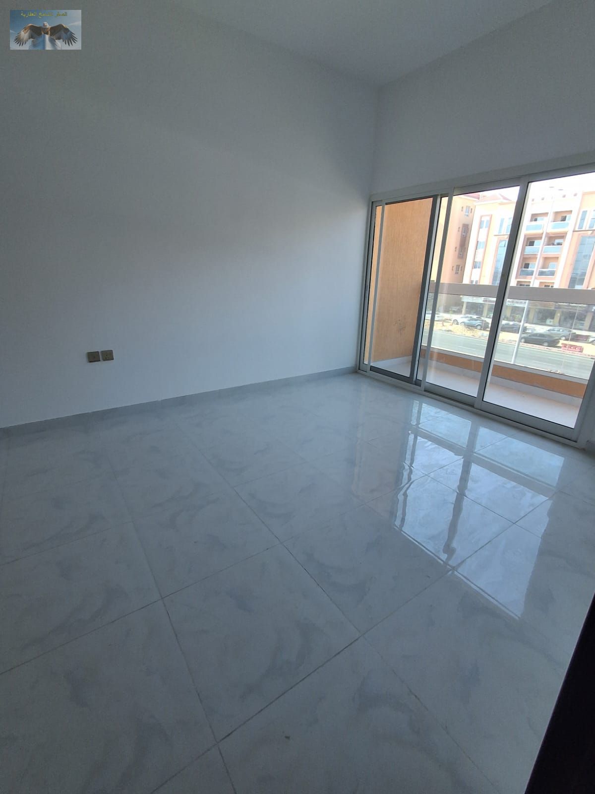 2BR apartment in Al Muweihat 3 Ajman near Al Shuwaifat School and Ajman Academy with 2 master bedrooms, external bathroom, balcony annual rent