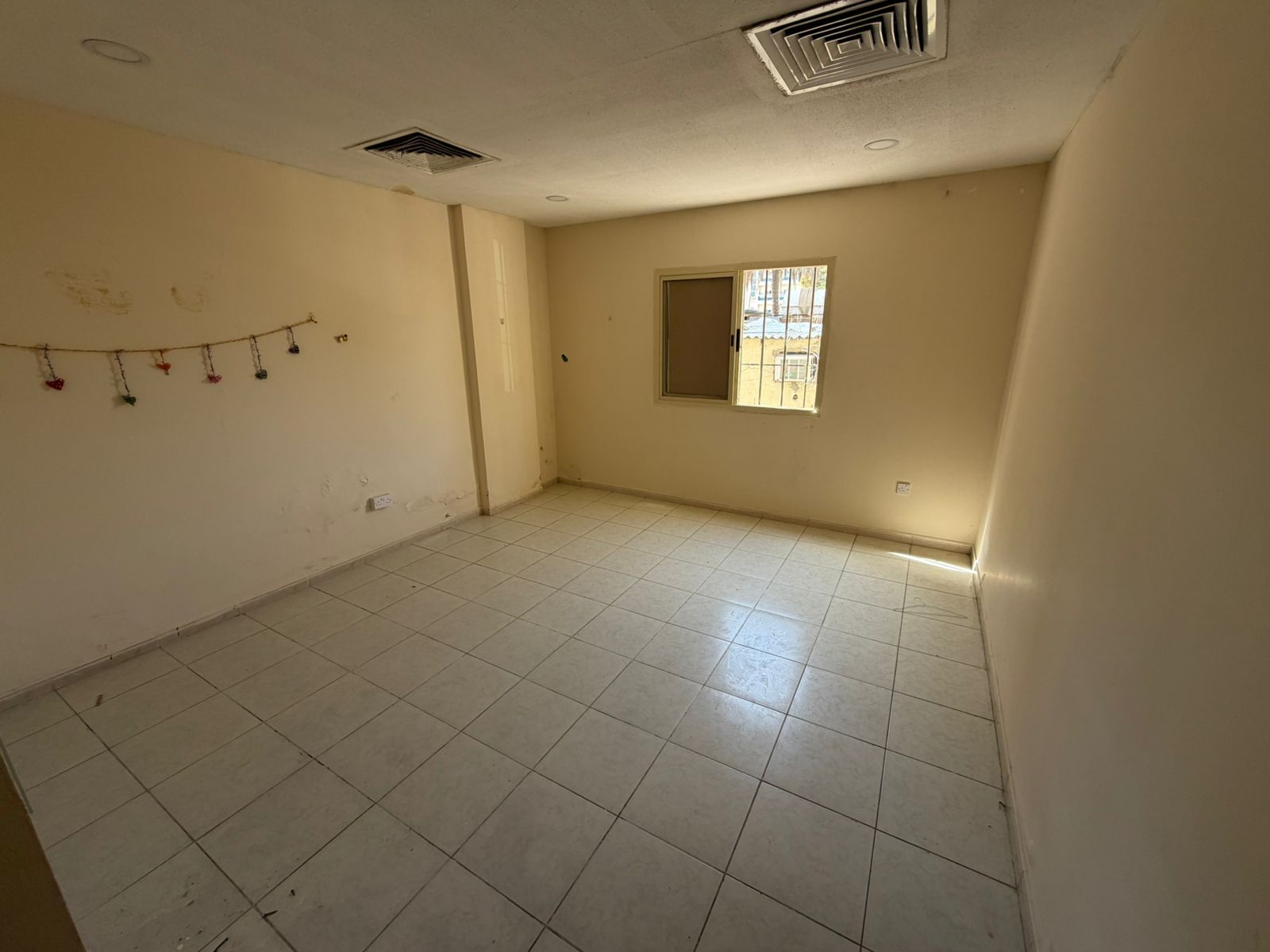 Lowest price and largest space ground floor studio in a prime location at a very reasonable price in a family building