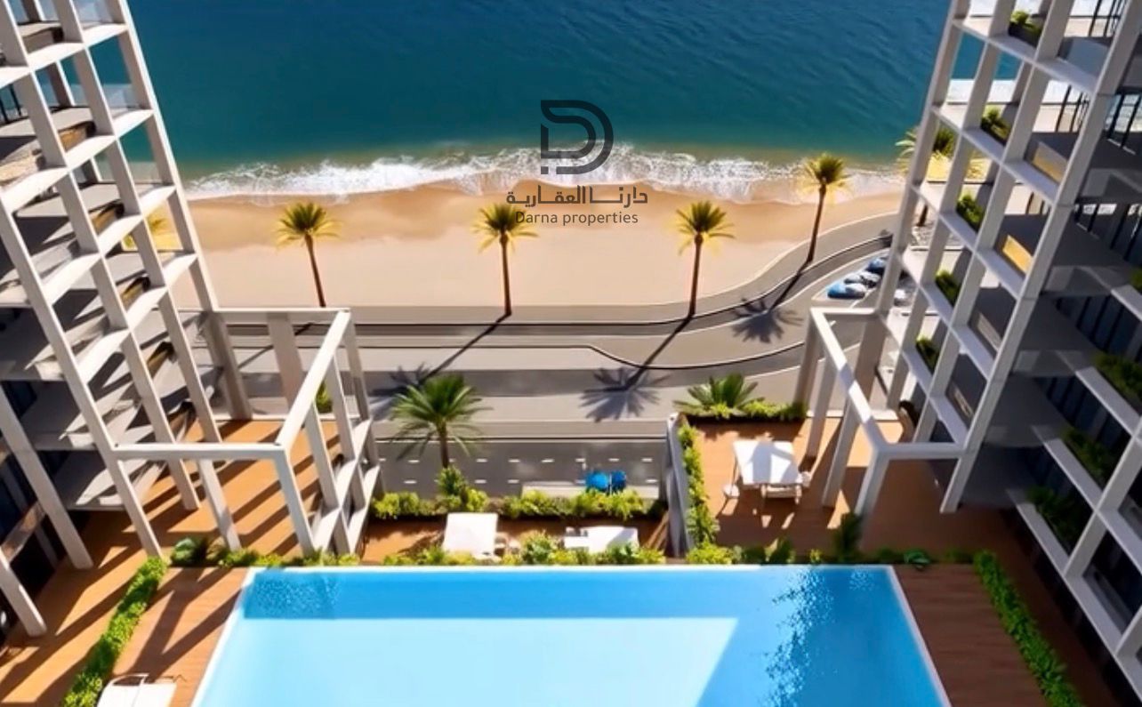A room and a hall located directly on the Ajman Corniche with a partial view of the Corniche with a large area of 1088 square feet with only 5% down payment and 1% installments per month for 5 years without commission and without registration fees and fre