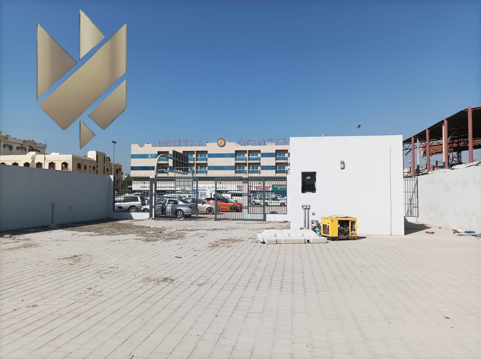 Industrial yard in Industrial Area 5 with 13,000 sqft total area, including 8,000 sqft fenced land and 5,000 sqft parking area, priced at 300,000 on 4