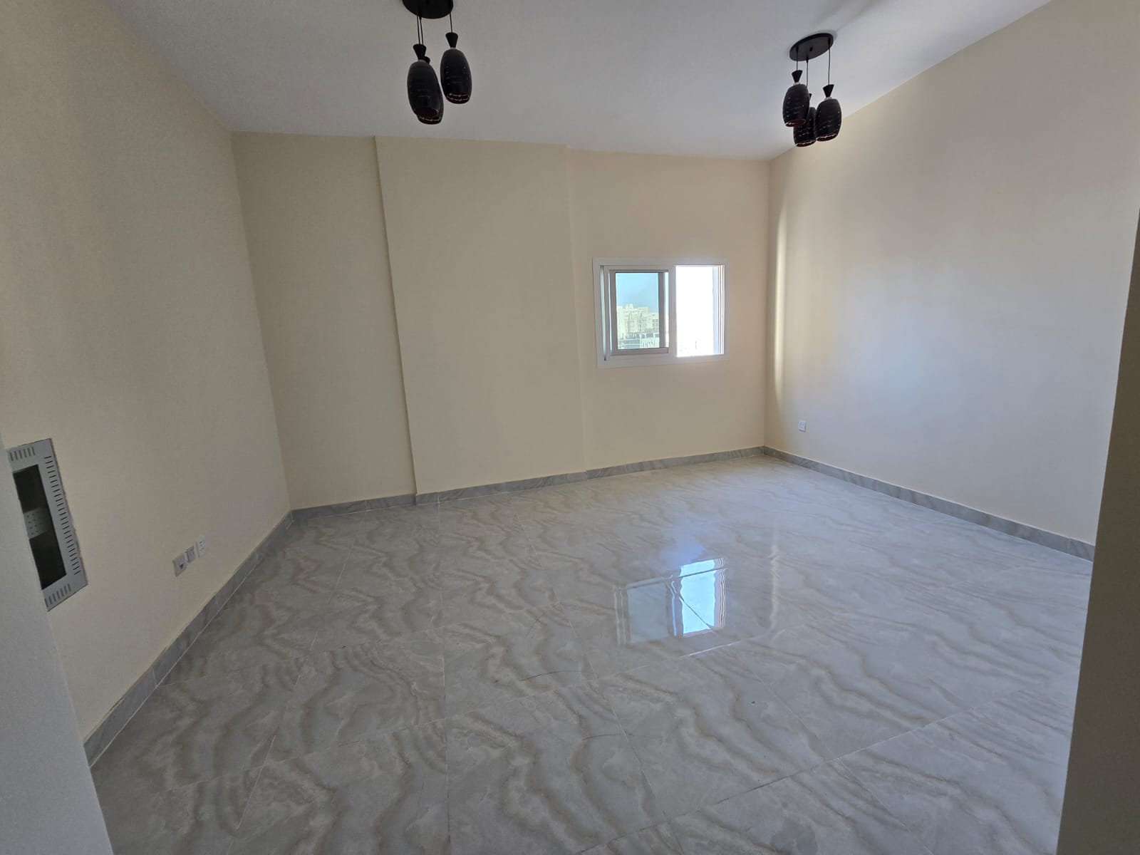 First tenant in a new building, studio apartment for annual rent in a prime location in Al Jurf 3, separate kitchen with central air conditioning,