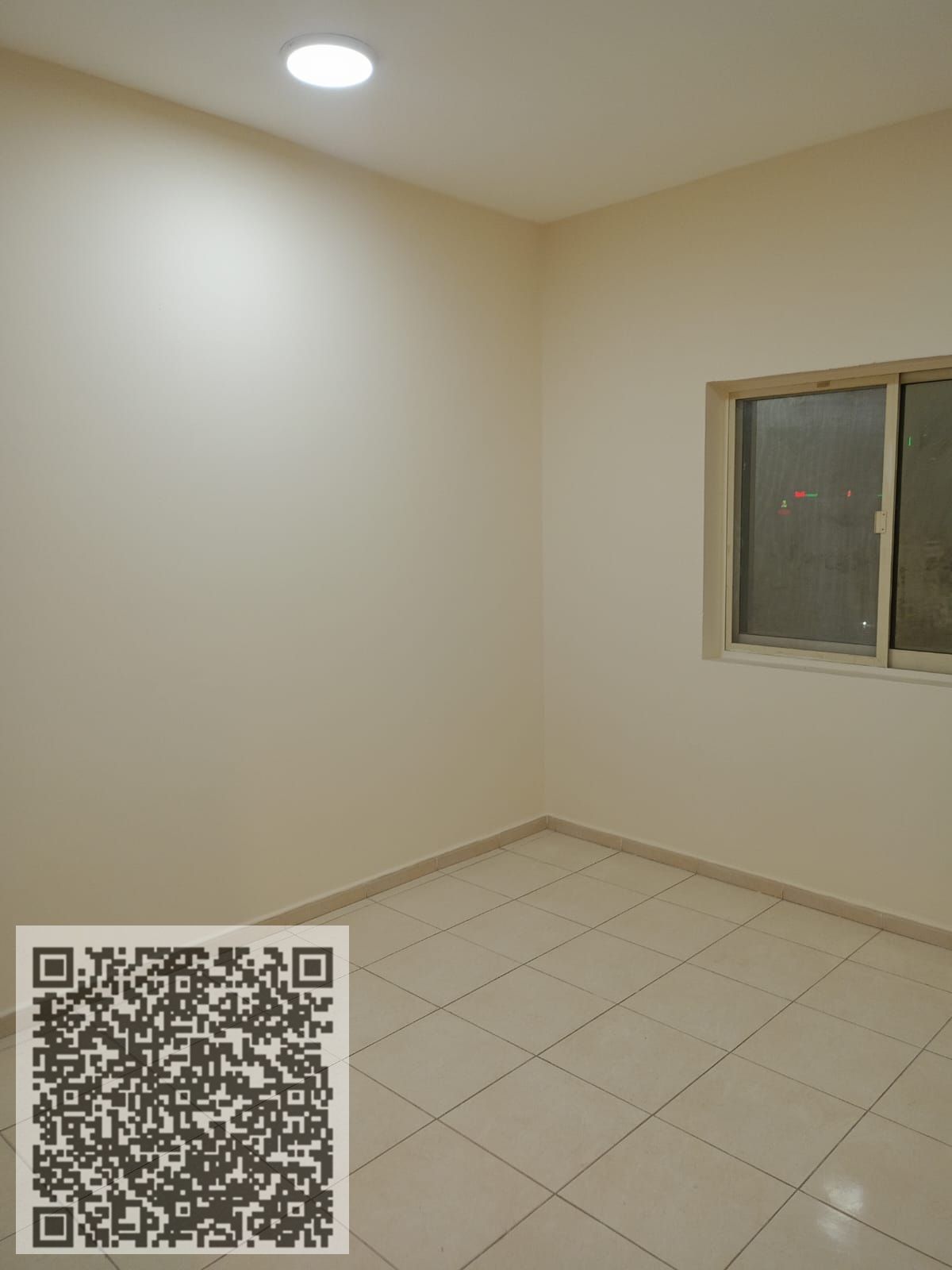 Two-bedroom apartment with a living room for annual rent in Al Rashidiya 2, next to Falcon Towers