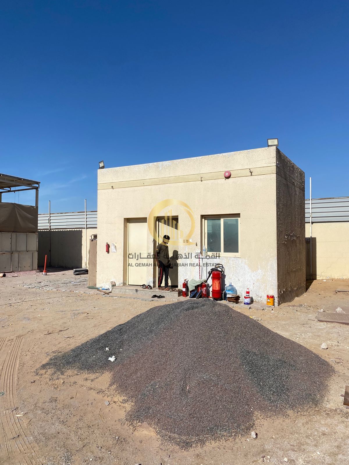 For sale in Al-Sajja Industrial Area: a fenced land. Area: 10,800 square feet, owned by citizens and Gulf residents.