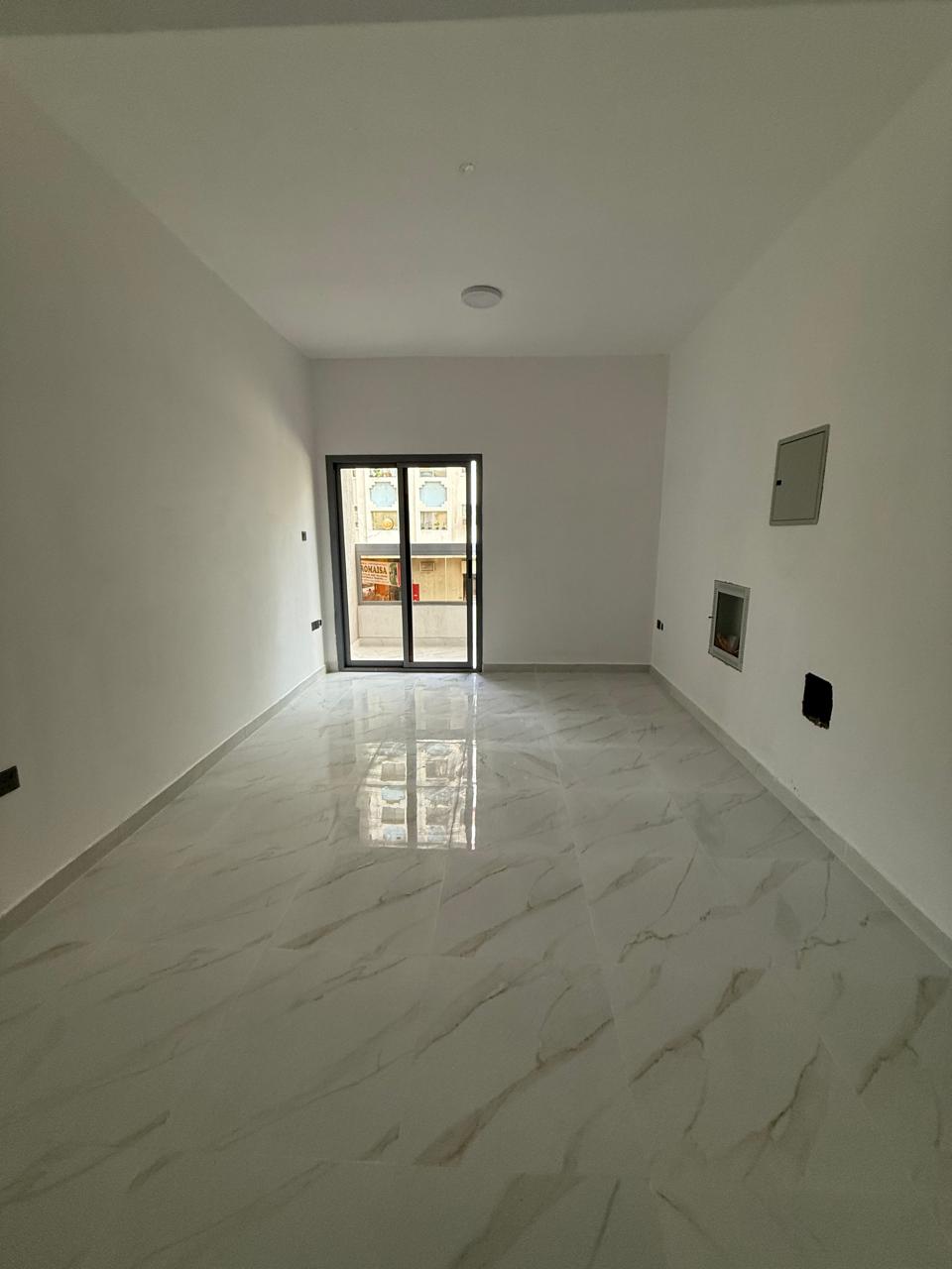 Brand new one-bedroom apartment, first occupancy, for annual rent – second row from Ajman Corniche