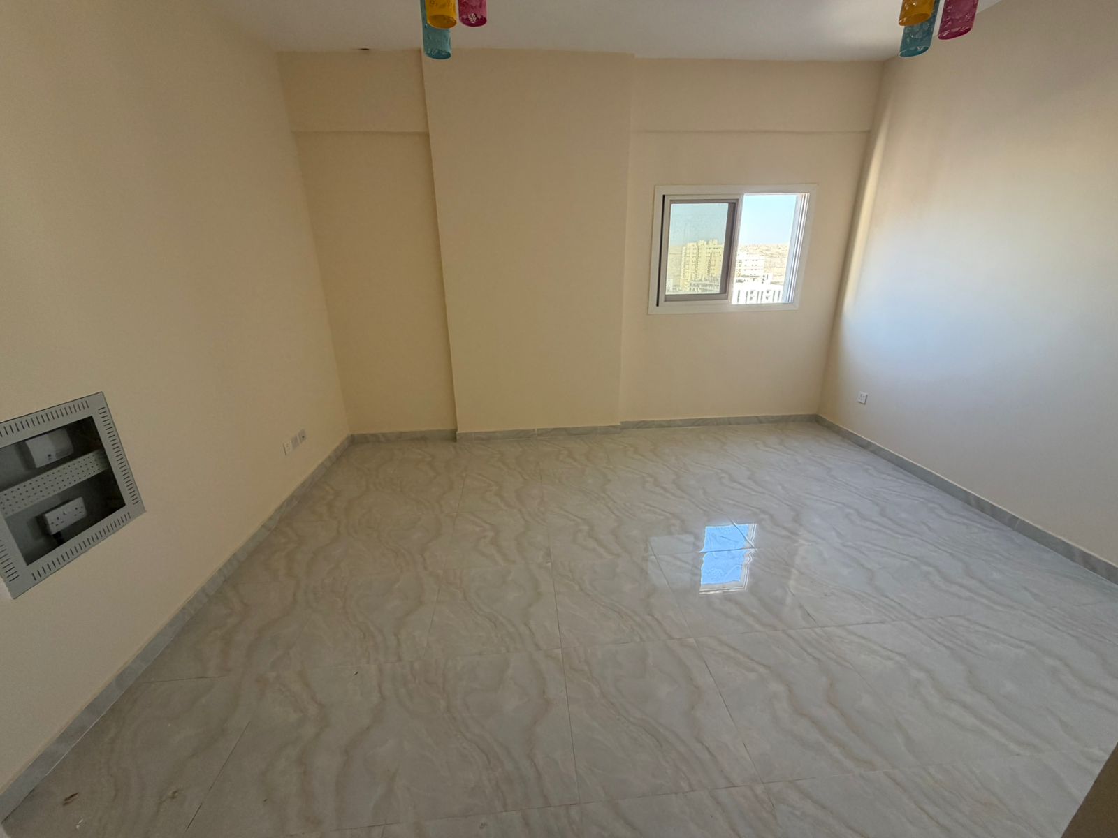 First occupancy studio apartment - annual rent - family accommodation - separate kitchen - central air conditioning - free maintenance