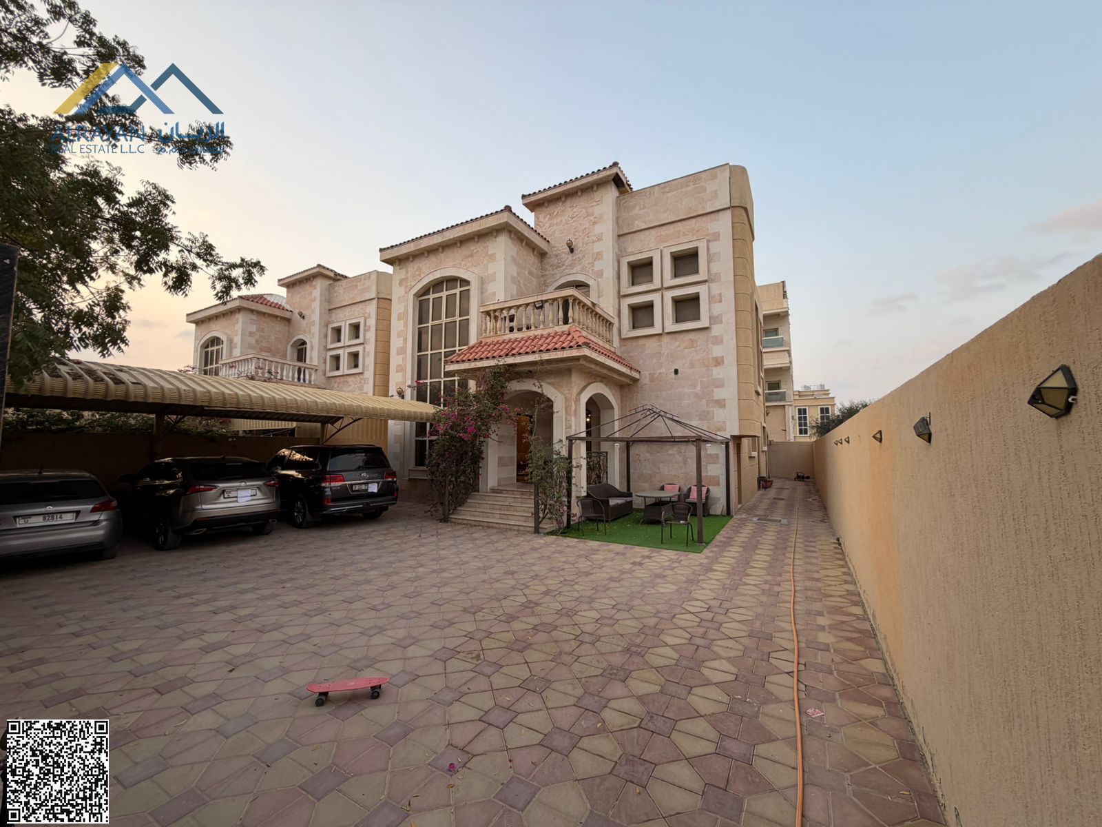 A beautiful, fully maintained villa with a distinctive stone facade.