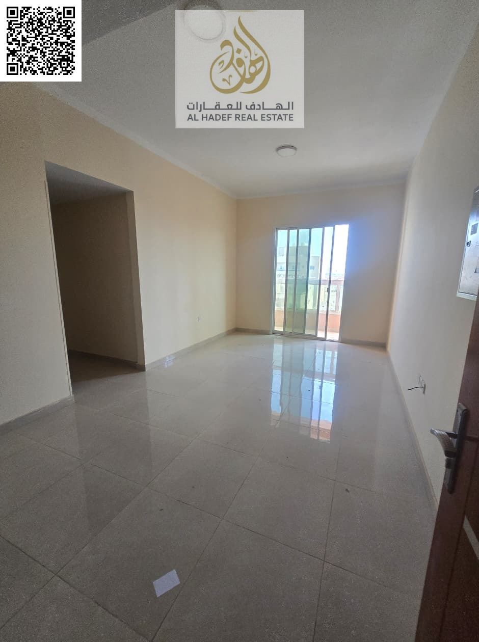 Apartment Details: Spacious 2-bedroom apartment located in Al Rawda 1, Ajman, near Al Hamidiya Police Station, in a prime and family-friendly area