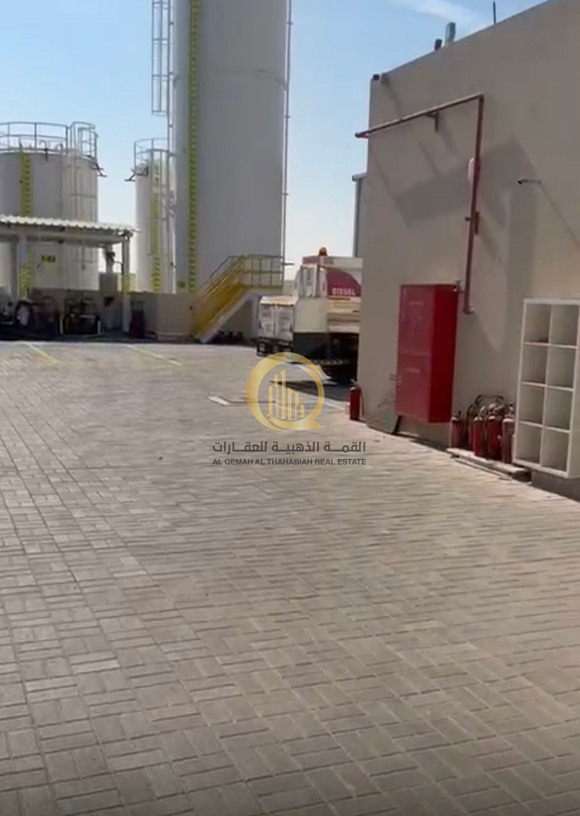 For sale: a gated compound in Sharjah, Al Sajaa area, Al Hanou Al Jaleel, with a very outstanding space of 14,500 sq ft, consisting of two shops and a