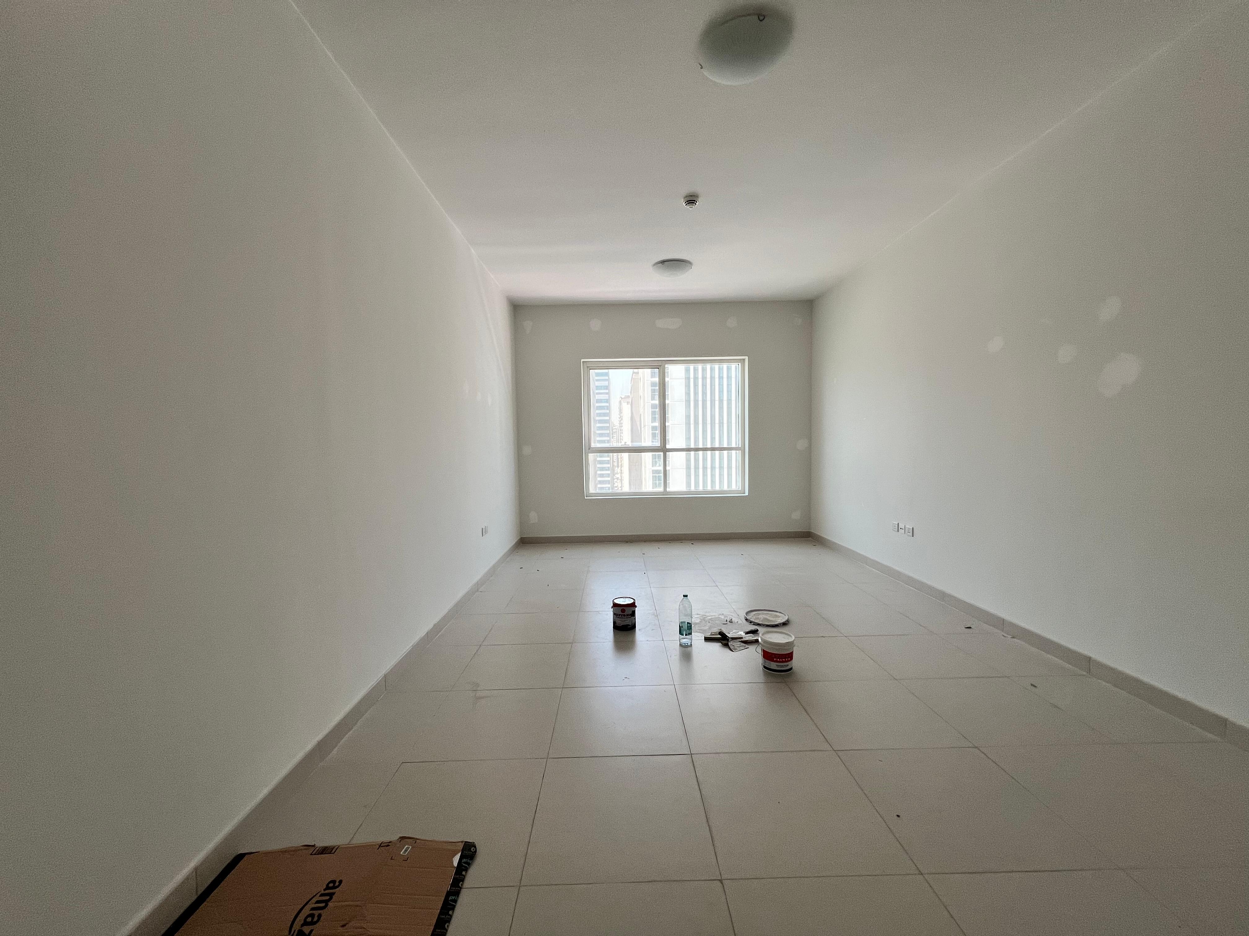 Second tenant, luxury two-bedroom apartment with living room and parking, ready for immediate move-in, directly on Dubai exit.