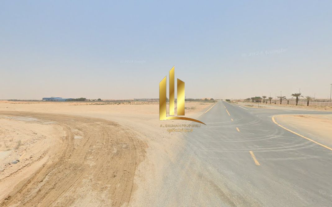 For sale in Al Sajaa Industrial Area, Sharjah: Industrial land measuring 10,700 sq ft. Industrial permit for warehouses. Located near the main road