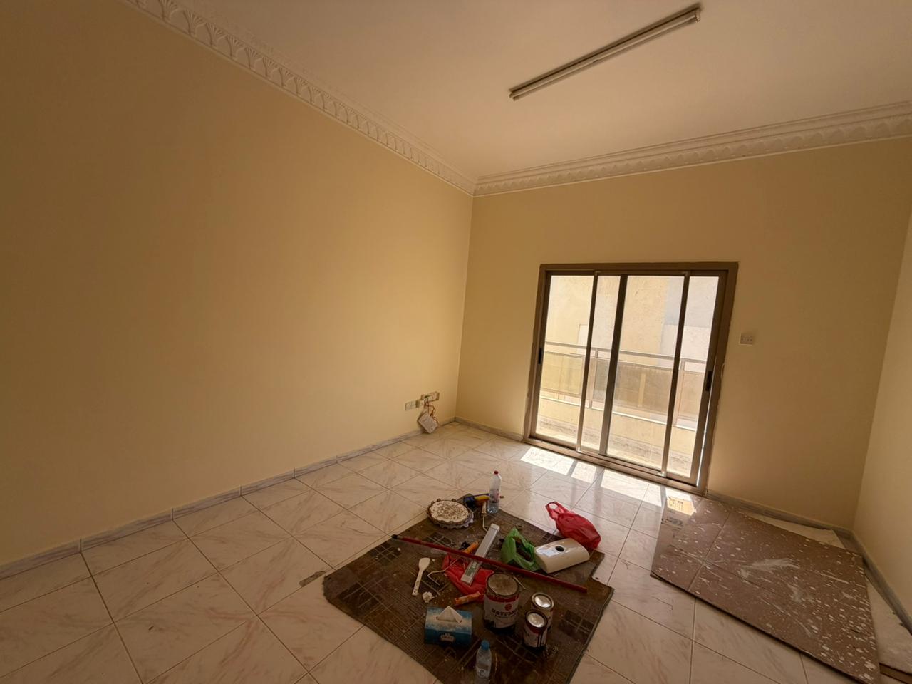 balcony featuring an open view and central AC – close to all services at a great price in Al Qasimia, Al Mahatta – high-quality finishing – spacious l
