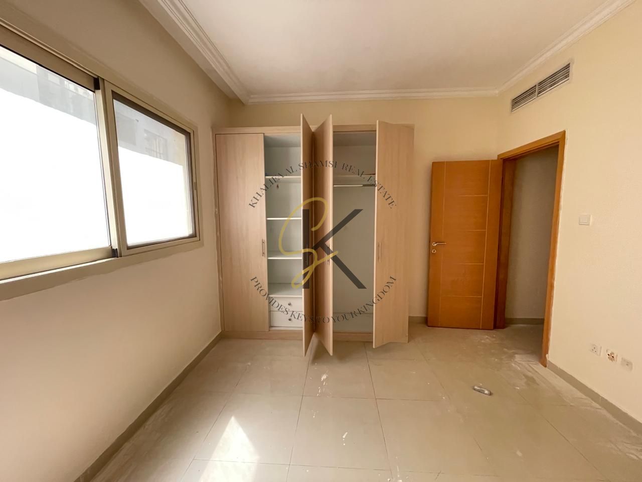 Spacious Unfurnished 1BHK with Balcony & Dedicated Parking | 2 Washrooms | 980 Sqft Family Apartment in Muwailah Commercial, Sharjah