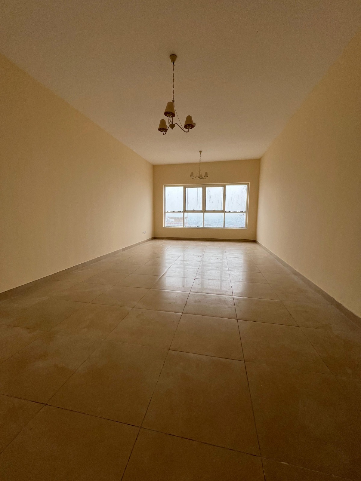 For rent: **luxury 2BR apartment with living room in Al Khan**, open rear view, parking, gym & pool, flexible payment options.