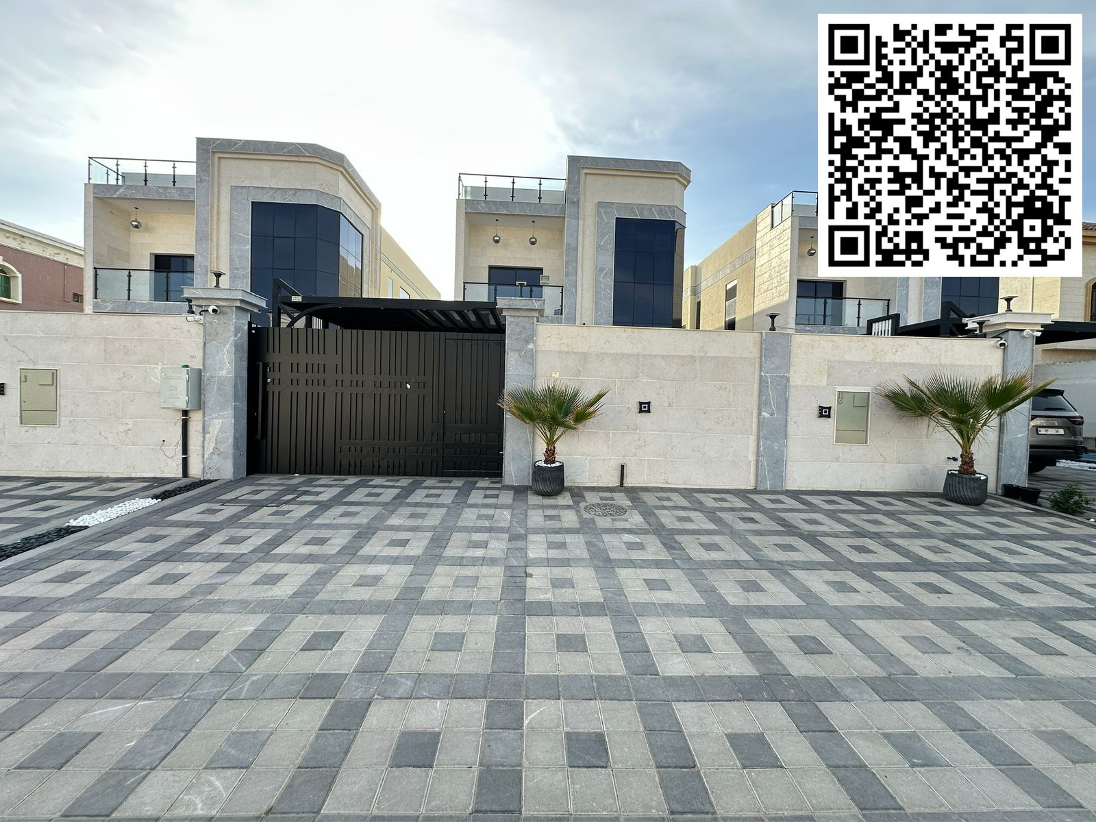 For sale: Super deluxe residential investment villa with marble cladding. Luxurious finishing and a prime location on a paved road with parking in Ajm