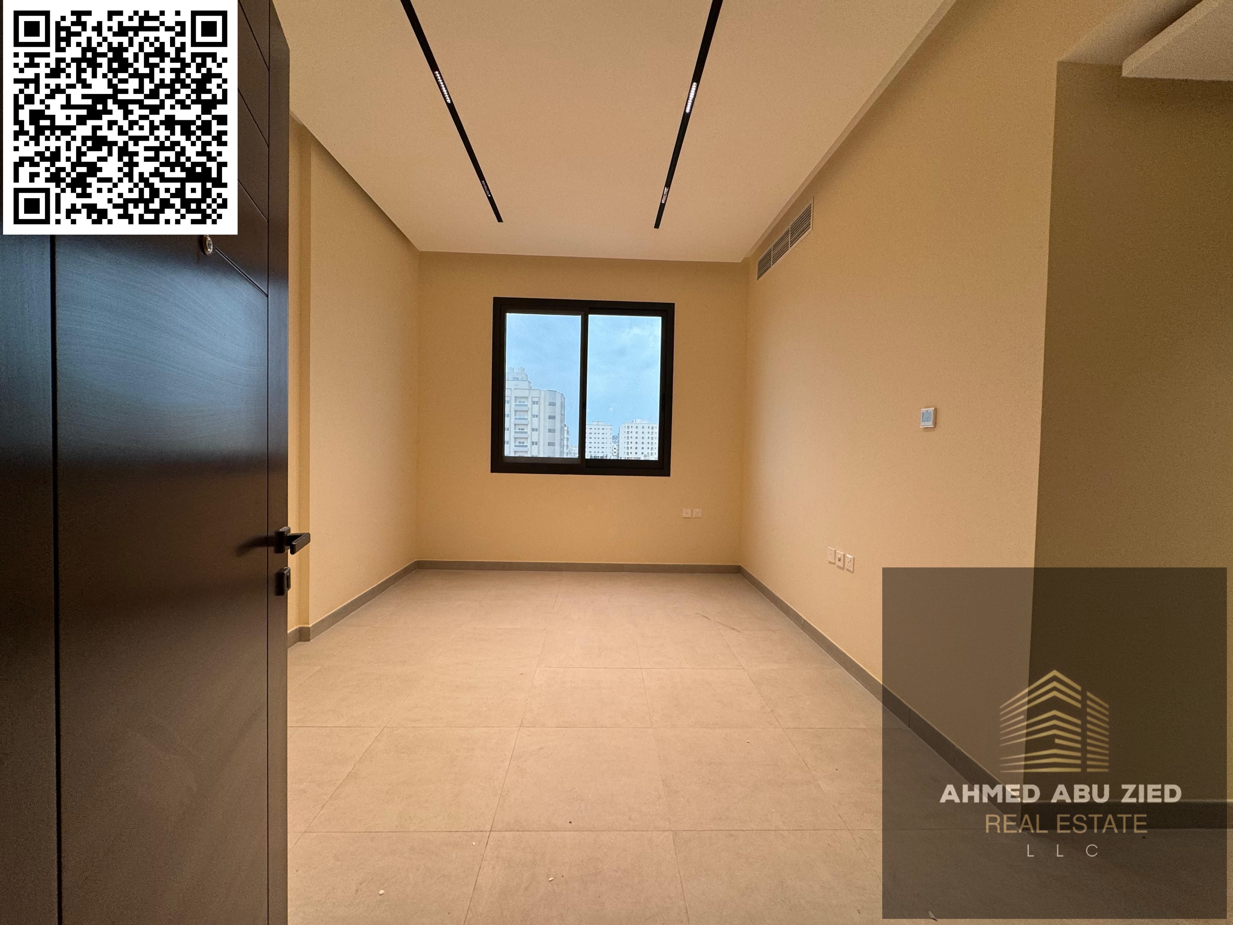 For annual rent in Ajman, Al Jurf 3: first tenant, luxury 2BR apartment with living room, 2 baths, balcony, super deluxe, central AC, AED 40,000, 4 or