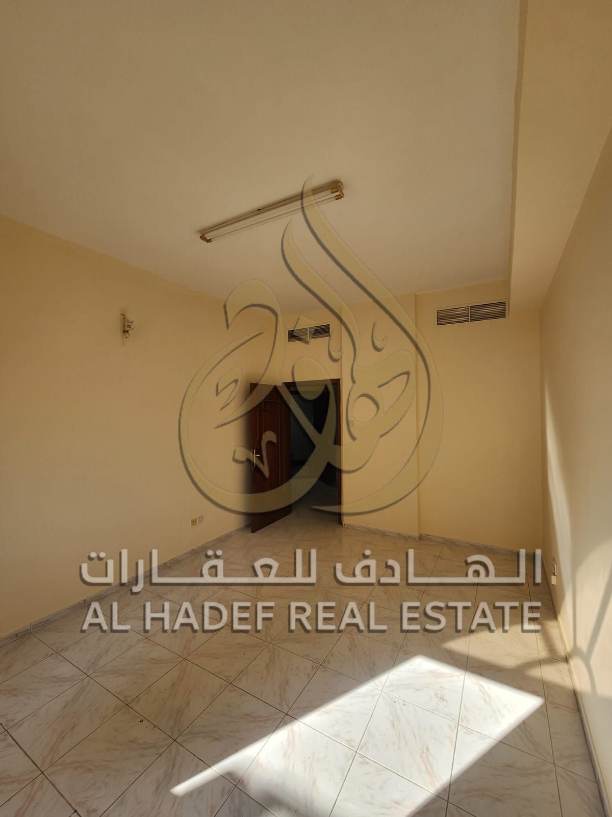 One-bedroom apartment with a comfortable size and modern finishing - balcony - natural ventilation and lighting - Al Qasimia Station