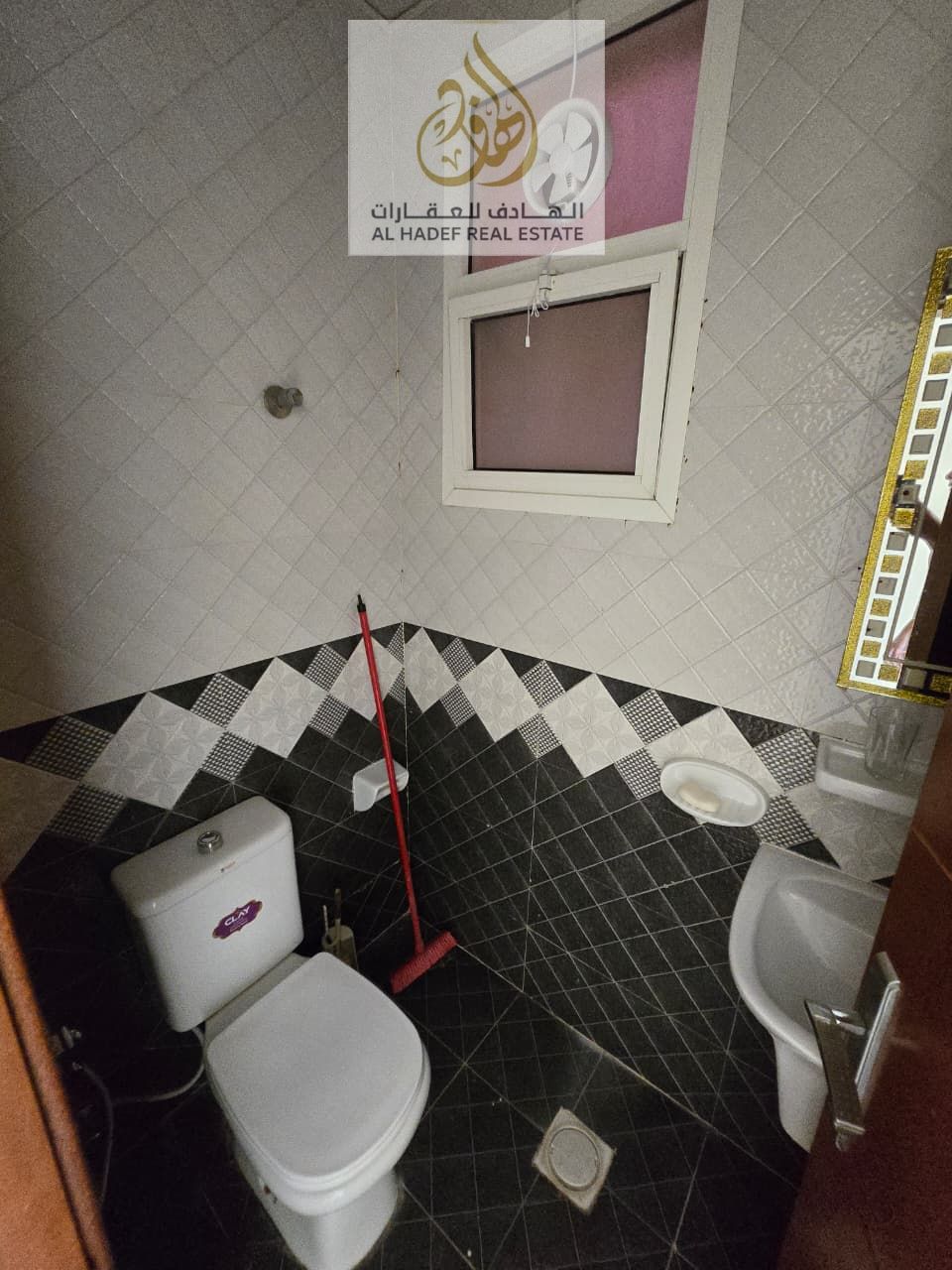 For rent in Ajman, a comfortable 1-bedroom apartment with a living room, 2 bathrooms, and a balcony, located in Al Rawda 1, close to Al Hamidiya Polic