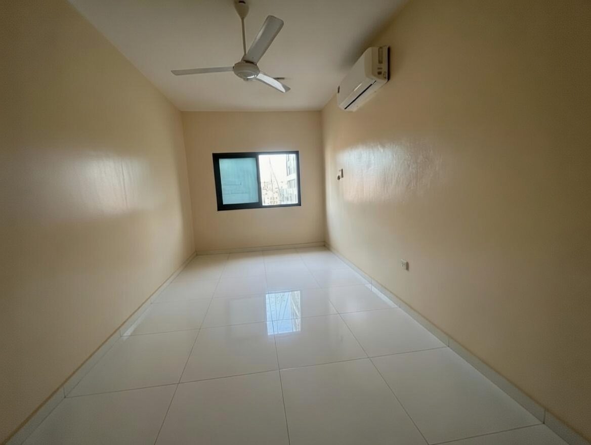 1BHK in Al Qulaya with balcony, AED 27,888 yearly, easy payments, no fees, close to services and main roads.
