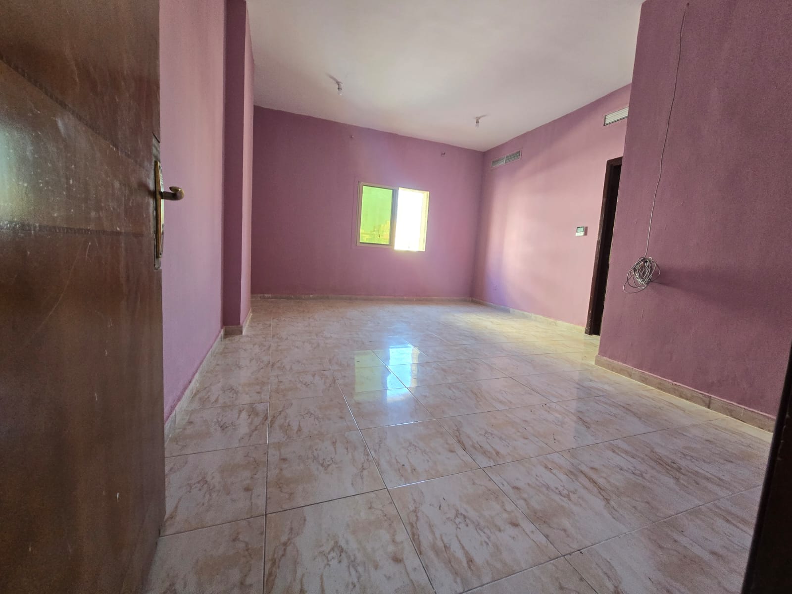 Large studio apartment - available for annual rent - suitable for families - separate kitchen - central air conditioning - free maintenance
