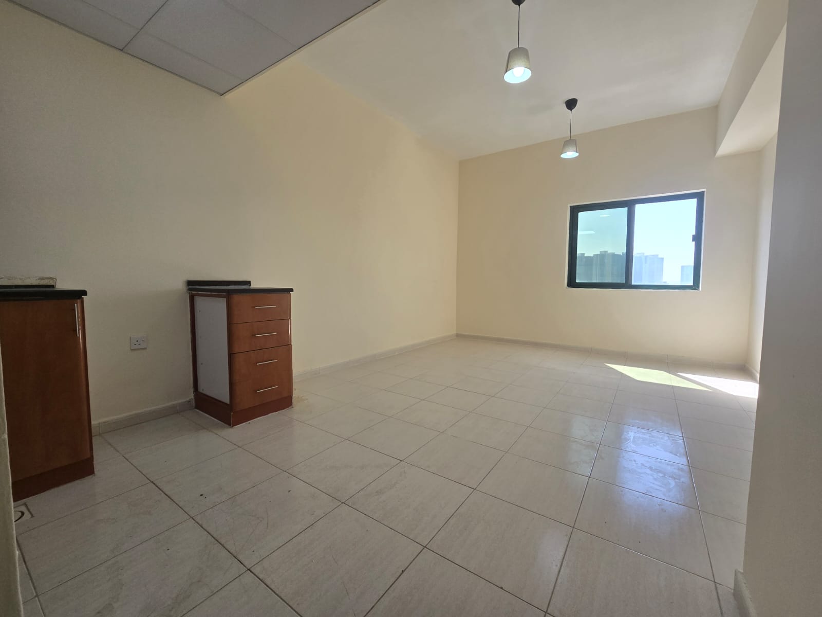 First occupancy studio apartment - annual rent - family accommodation - central air conditioning - free maintenance