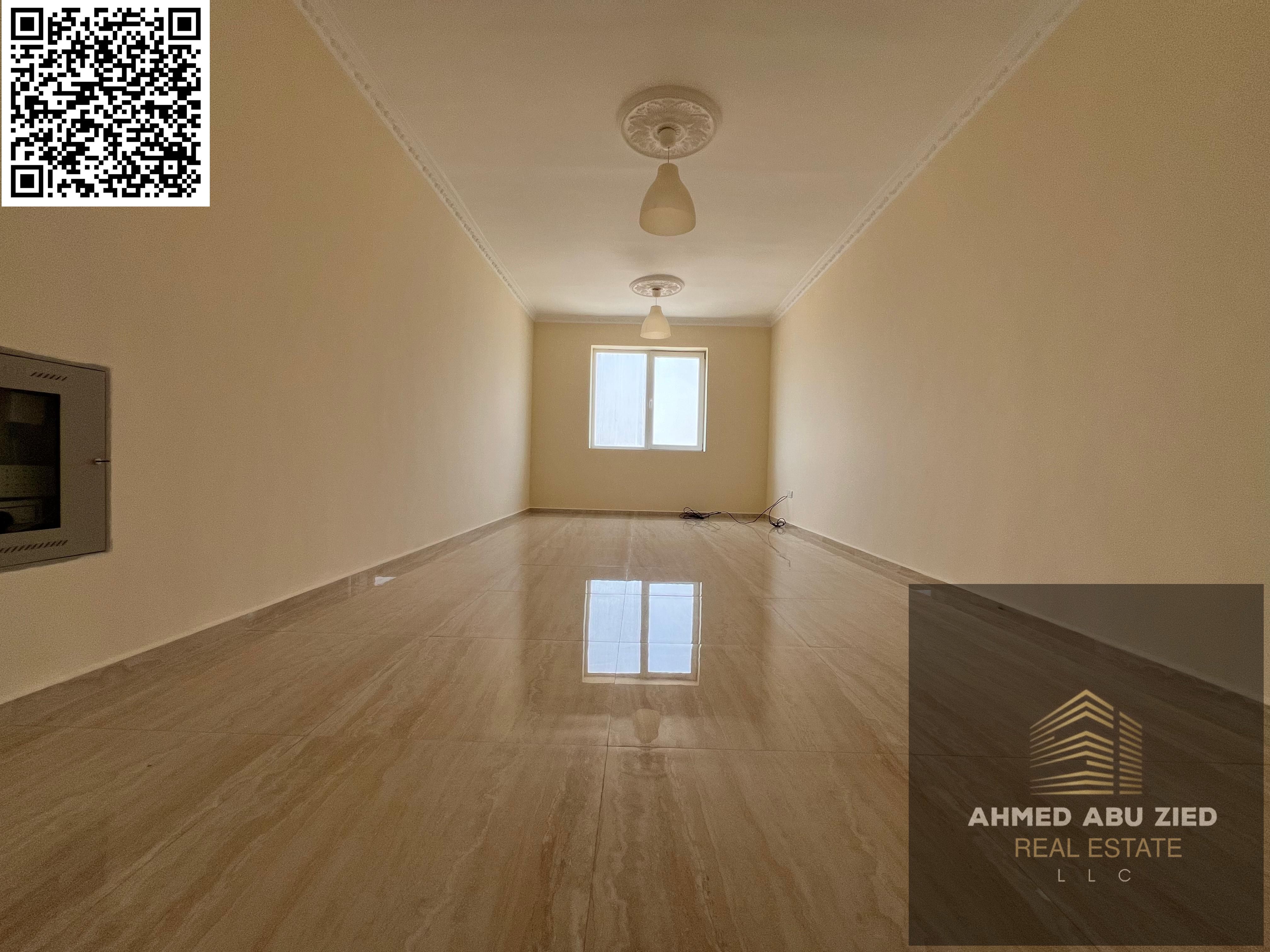 Luxury two-bedroom apartment for annual rent in Al Nuaimiya 3, Ajman | 2 bathrooms | Central air conditioning | Balcony with open view | Free parking