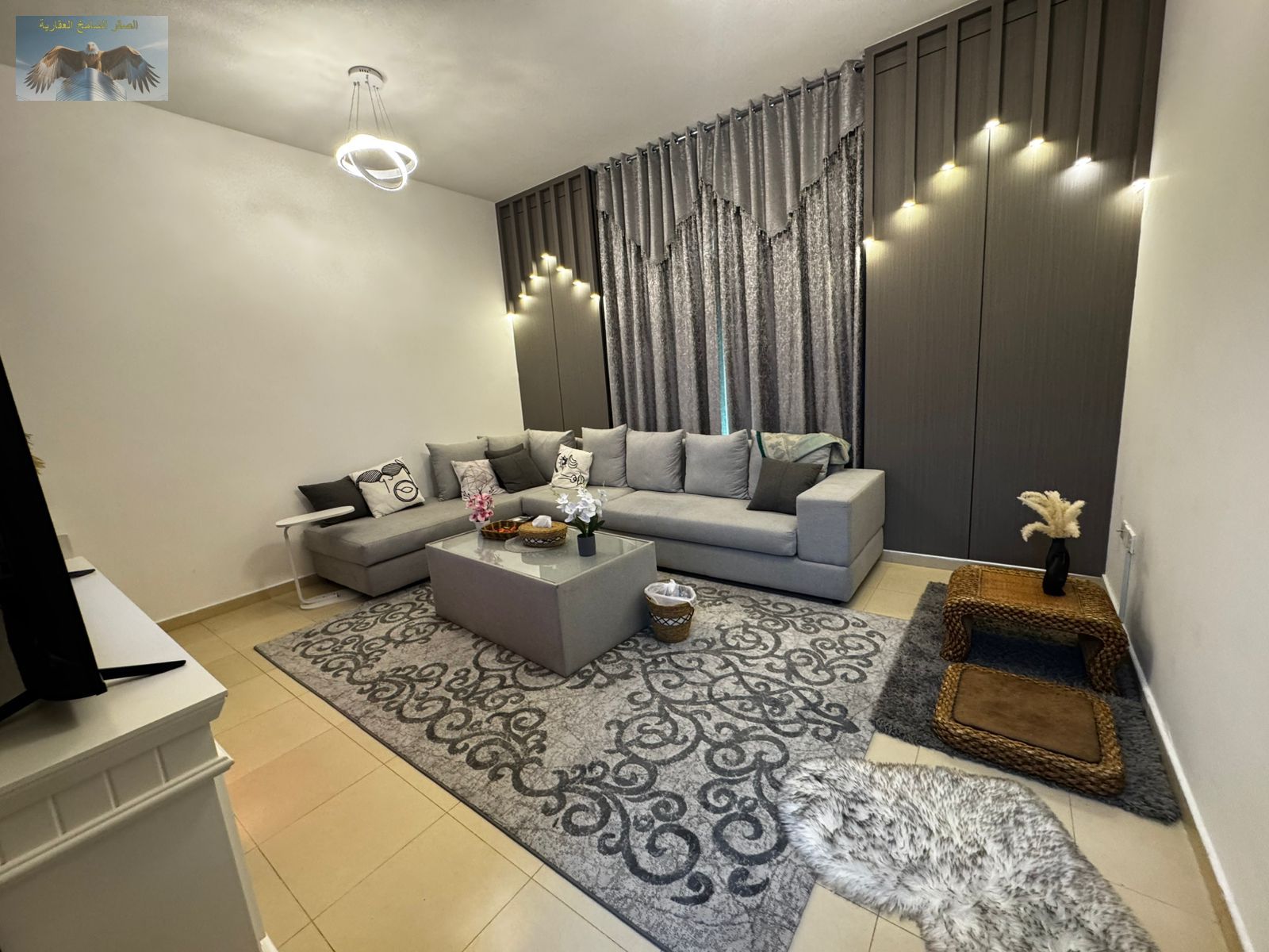 2BR hall yearly rent, fully furnished, new modern decor, parking, 2 balconies, open view in City Towers Ajman, prime Ajman.