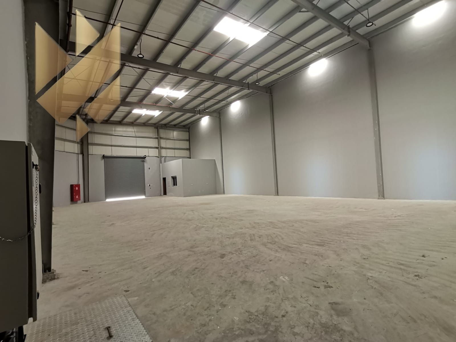 Warehouses in Al Saja’a with 3,000 sqft area and 70KW power supply, suitable for storage and industrial use, priced at 220,000 on 4 payments.