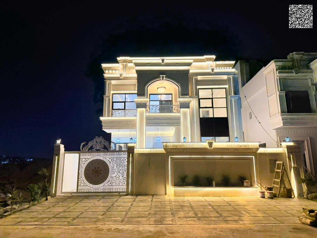 A villa with a modern modern design in Al Helio 2, directly next to the Al Zahia project, including registration and ownership fees, with central air