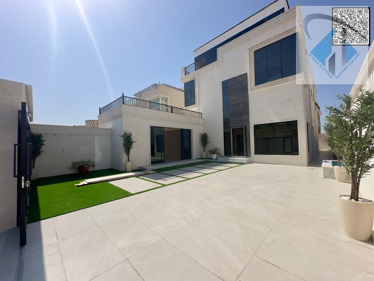 Luxury villa for sale in Ajman, Al Rawdha area, second plot from Sheikh Ammar Street