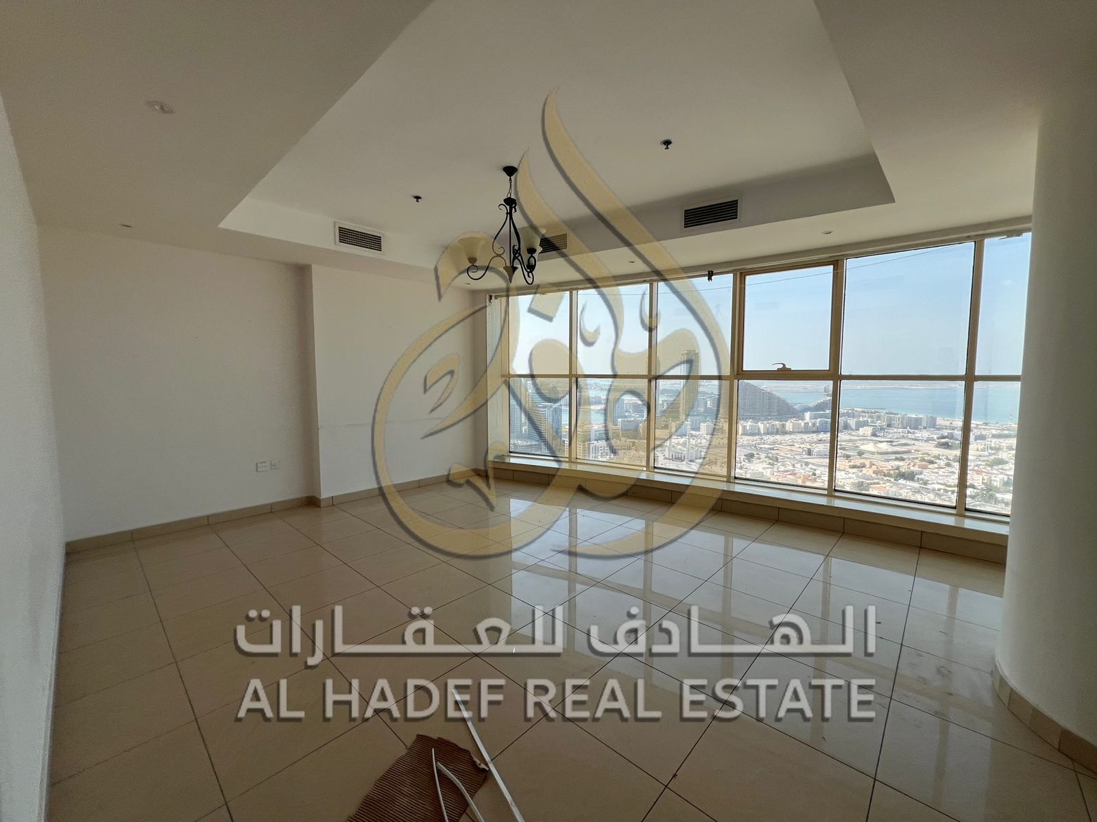 For rent in Al Majaz 3 - Two bedrooms, living room, and maid's room - Free parking - Free AC (owner included) - Free gym
