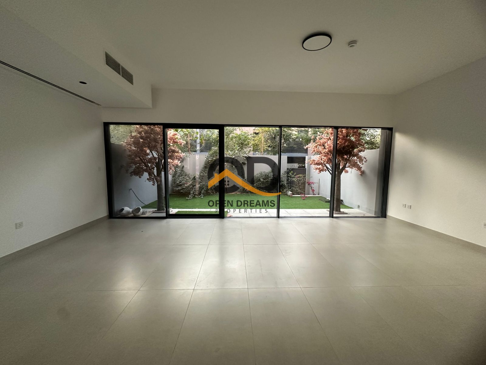 Garden Bliss Living: Elegant 3BR + Maid’s Room in Masar with Serene Views
