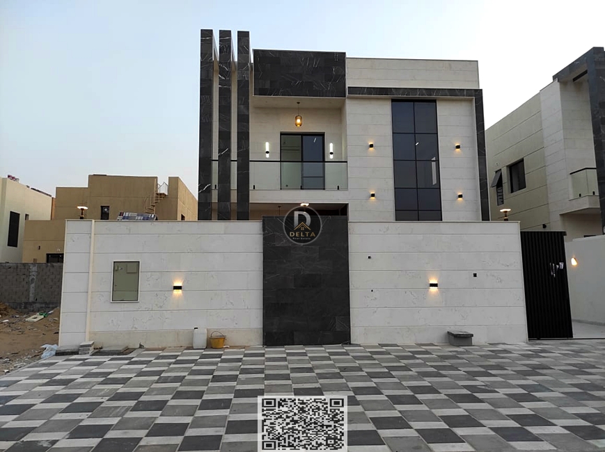 A modern stone-designed villa for sale in Al Bahia, Ajman, near Sheikh Mohammed Bin Zayed Road, with a private pool and spacious areas. The price is n