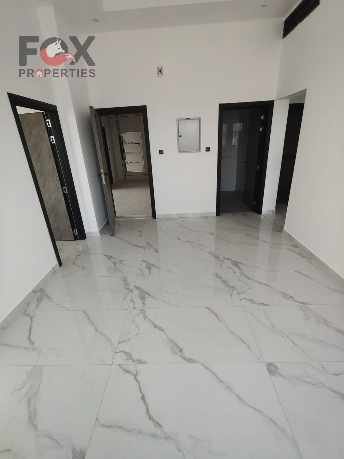 Two-bedroom apartment with a living room for annual rent in Ajman - Al Alia area, directly on Sheikh Mohammed Bin Zayed Road.