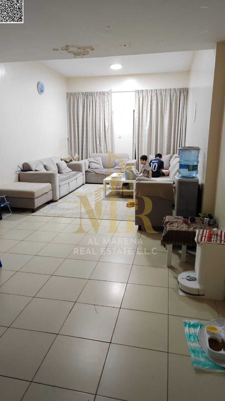 One-bedroom apartment for sale in Ajman One Towers, measuring 1260 sq ft, with a laundry room, located on the sixth floor with a stunning view and par