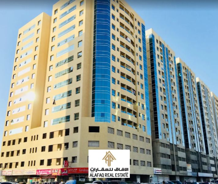 Two bedrooms and a living room in the heart of Ajman with private parking – high investment return