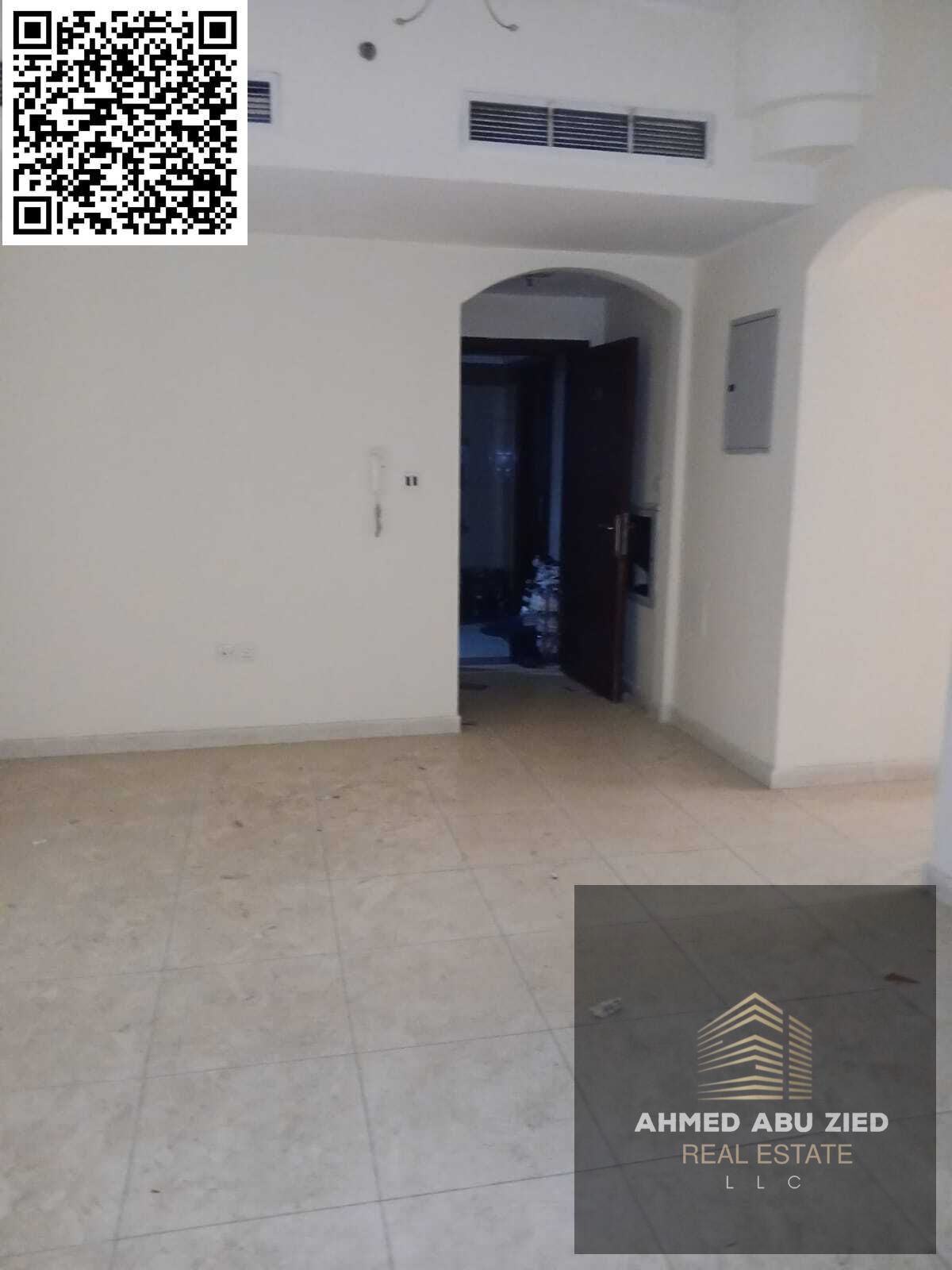 2-BR apartment with living room for annual rent in Al-Naeemia 1, Ajman, 2 baths, spacious living area, balcony, large kitchen, 35,000 AED, 4–6 install