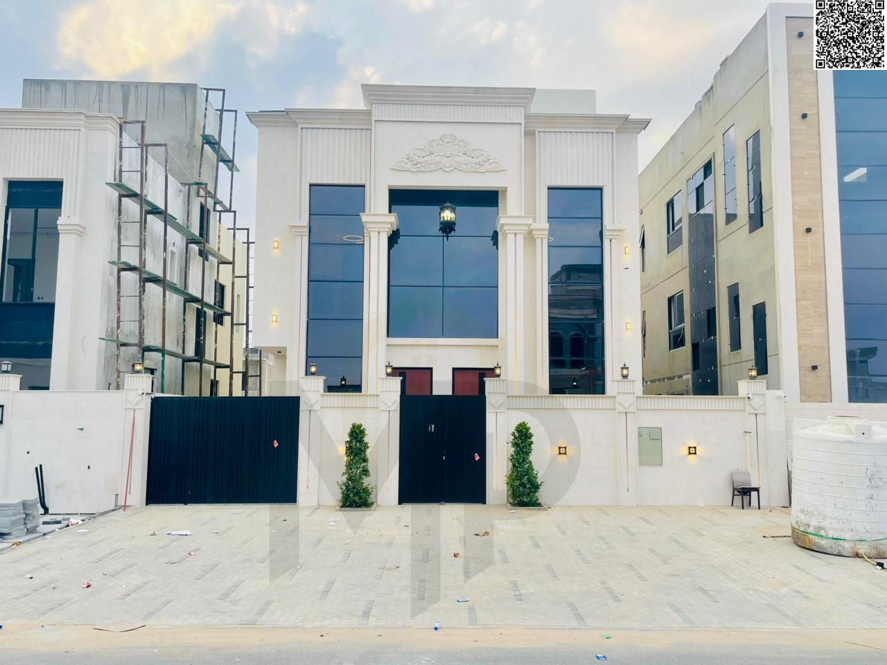 The most luxurious villas in Ajman with an elegant classic design, two floors + roof, at a price including registration fees.