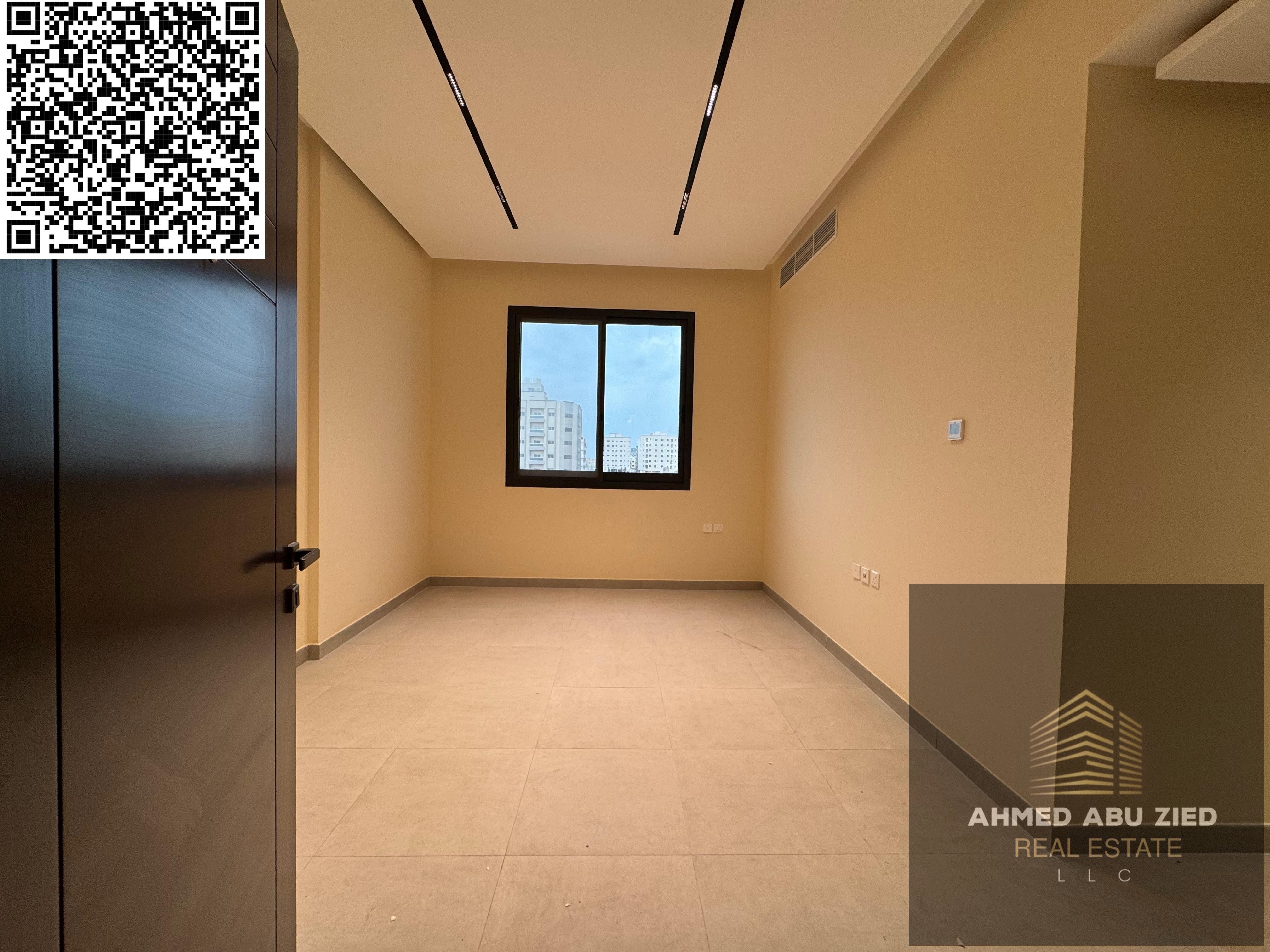 Two bedrooms and a living room with two bathrooms, one month free, built-in wardrobes, a distinctive balcony with an open view, and a fully equipped k